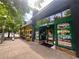 Front view of B-Side Coffee and Bagels featuring large windows with visible signage and outdoor seating at 320 Kirk Rd, Decatur, GA 30030