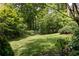 Picturesque backyard featuring a well-manicured lawn and privacy fencing at 320 Kirk Rd, Decatur, GA 30030