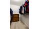 Walk-in closet with wire shelving and built-in wooden dresser at 320 Kirk Rd, Decatur, GA 30030