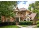 Charming brick two-story home with a landscaped front yard and inviting entrance at 320 Kirk Rd, Decatur, GA 30030