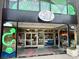 External view of the Little Shop of Stories, a local bookstore, with colorful storefront and signage at 320 Kirk Rd, Decatur, GA 30030