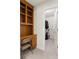 Office space with desk and built in shelves, leading to a walk in closet at 320 Kirk Rd, Decatur, GA 30030