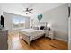 Bright bedroom with neutral walls, natural light and comfortable furnishings at 8007 Wishaw Ct, Winston, GA 30187