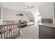 Bedroom with ceiling fan, two twin beds, rocking chair, and playful decor at 8007 Wishaw Ct, Winston, GA 30187
