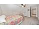 Cozy bedroom with carpeted floors, a ceiling fan and natural light at 8007 Wishaw Ct, Winston, GA 30187