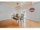 Dining room features wood floors, a wooden ceiling and decorative wall art at 8007 Wishaw Ct, Winston, GA 30187