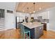 Bright kitchen with white cabinets, stainless steel appliances, and an island at 8007 Wishaw Ct, Winston, GA 30187