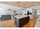 Open kitchen with an island and stainless steel appliances at 8007 Wishaw Ct, Winston, GA 30187