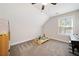 Angled playroom with carpet, a ceiling fan, piano, and a table for toys at 8007 Wishaw Ct, Winston, GA 30187