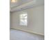 Comfortable bedroom with a large window and soft natural light at 178 Haverling Pass, Hampton, GA 30228