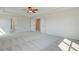 Large main bedroom with tray ceiling and access to ensuite bath at 178 Haverling Pass, Hampton, GA 30228