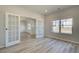 Office space with glass french doors, wood-look floors, and natural light at 178 Haverling Pass, Hampton, GA 30228