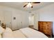 Bedroom featuring hardwood floors, neutral colored walls, and access to hallway at 2230 Peachtree Ne Rd # A-3, Atlanta, GA 30309