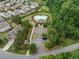 Aerial view of a neighborhood pool, clubhouse, and playground at 3805 Alden Pl, Cumming, GA 30028
