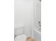 Clean white toilet, tub with shower and tile flooring at 3805 Alden Pl, Cumming, GA 30028