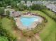 Aerial view of the community pool, playground, and amenities at 3805 Alden Pl, Cumming, GA 30028