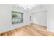 Elegant dining room with coffered ceilings, hardwood floors, and large windows at 3805 Alden Pl, Cumming, GA 30028