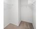 Walk-in closet with carpet floor and wire shelving at 3805 Alden Pl, Cumming, GA 30028
