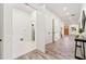 Bright hallway with ample storage, leading to various rooms in the home at 6054 Heritage Se Way, Mableton, GA 30126