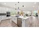 Bright and airy kitchen with stainless steel appliances, a spacious island, and open layout at 6054 Heritage Se Way, Mableton, GA 30126