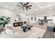 Open-concept living area with stylish decor, modern lighting, and seamless flow to the kitchen at 6054 Heritage Se Way, Mableton, GA 30126