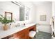 Bathroom features vanity with generous counter space, a soaking tub, and natural light at 629 Hansell Se St, Atlanta, GA 30312