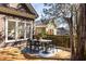Outdoor dining area on wooden deck with backyard view at 629 Hansell Se St, Atlanta, GA 30312