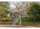 Attractive home with a cozy front porch and a well-manicured landscape at 629 Hansell Se St, Atlanta, GA 30312