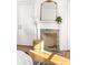 Close-up of bedroom fireplace with decorative mantel, mirror, and eye-catching tile at 629 Hansell Se St, Atlanta, GA 30312