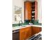 Gourmet kitchen featuring quartz countertops, wood cabinets, and a stainless steel sink at 629 Hansell Se St, Atlanta, GA 30312
