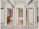 Mirrored view of the bathrooms with a tub shower combination and neutral tile floors at 950 W Peachtree Nw St # 1613, Atlanta, GA 30309