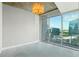 Cozy bedroom with city views from large windows, providing ample natural light at 950 W Peachtree Nw St # 1613, Atlanta, GA 30309