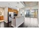 Modern kitchen with stainless steel appliances, granite countertops, and sleek wood cabinets at 950 W Peachtree Nw St # 1613, Atlanta, GA 30309
