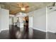 Open-concept living room with kitchen featuring hardwood floors and great natural light at 950 W Peachtree Nw St # 1613, Atlanta, GA 30309