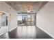 Spacious living room with floor-to-ceiling windows offering great views of the cityscape at 950 W Peachtree Nw St # 1613, Atlanta, GA 30309