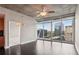 Bright living room featuring floor to ceiling windows and amazing views from the balcony at 950 W Peachtree Nw St # 1613, Atlanta, GA 30309