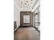 Inviting lobby entrance featuring modern lighting, artwork, and a comfortable bench at 950 W Peachtree Nw St # 1613, Atlanta, GA 30309