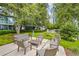 Inviting outdoor lounge with comfortable seating surrounded by trees and greenery at 950 W Peachtree Nw St # 1613, Atlanta, GA 30309