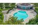 Scenic aerial view of a community pool with lounge chairs at 950 W Peachtree Nw St # 1613, Atlanta, GA 30309