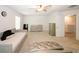 Bedroom with a neutral color scheme, offering a calming and versatile living space at 10162 Benton Woods Dr, Covington, GA 30014