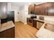 Modern kitchen featuring stainless steel appliances, granite countertops, and ample cabinet space at 10162 Benton Woods Dr, Covington, GA 30014