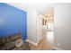 Open-concept living space featuring durable wood-look flooring and a comfortable seating arrangement at 10162 Benton Woods Dr, Covington, GA 30014