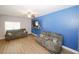 Spacious living room with modern decor, ceiling fan, and ample seating at 10162 Benton Woods Dr, Covington, GA 30014