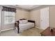 Comfortable bedroom featuring a daybed, plush carpet, and window at 1127 Oak Hollow Ct, Hampton, GA 30228