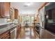 Bright kitchen featuring stainless steel appliances with breakfast nook at 1127 Oak Hollow Ct, Hampton, GA 30228