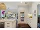This kitchen boasts an island with modern countertops and sink, stainless steel appliances, and bay window dining at 1199 Kenway Se Cir, Smyrna, GA 30082