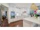 Open-concept kitchen with stainless steel appliances and white cabinets offers modern and bright cooking space at 1199 Kenway Se Cir, Smyrna, GA 30082