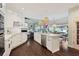 Modern kitchen with white cabinets, stainless appliances, eat-in breakfast nook, and an open floorplan at 1199 Kenway Se Cir, Smyrna, GA 30082