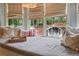 Inviting window seat with plush pillows, soft lighting and pleasant backyard views at 1199 Kenway Se Cir, Smyrna, GA 30082