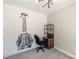 Unique bedroom with a modern light fixture and a charming giraffe wall art at 1303 Hill Se St, Atlanta, GA 30315